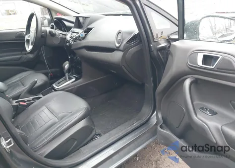 2016 Ford Fiesta Titanium z USA, uszkodzony, nr VIN 3FADP4FJXGM130417